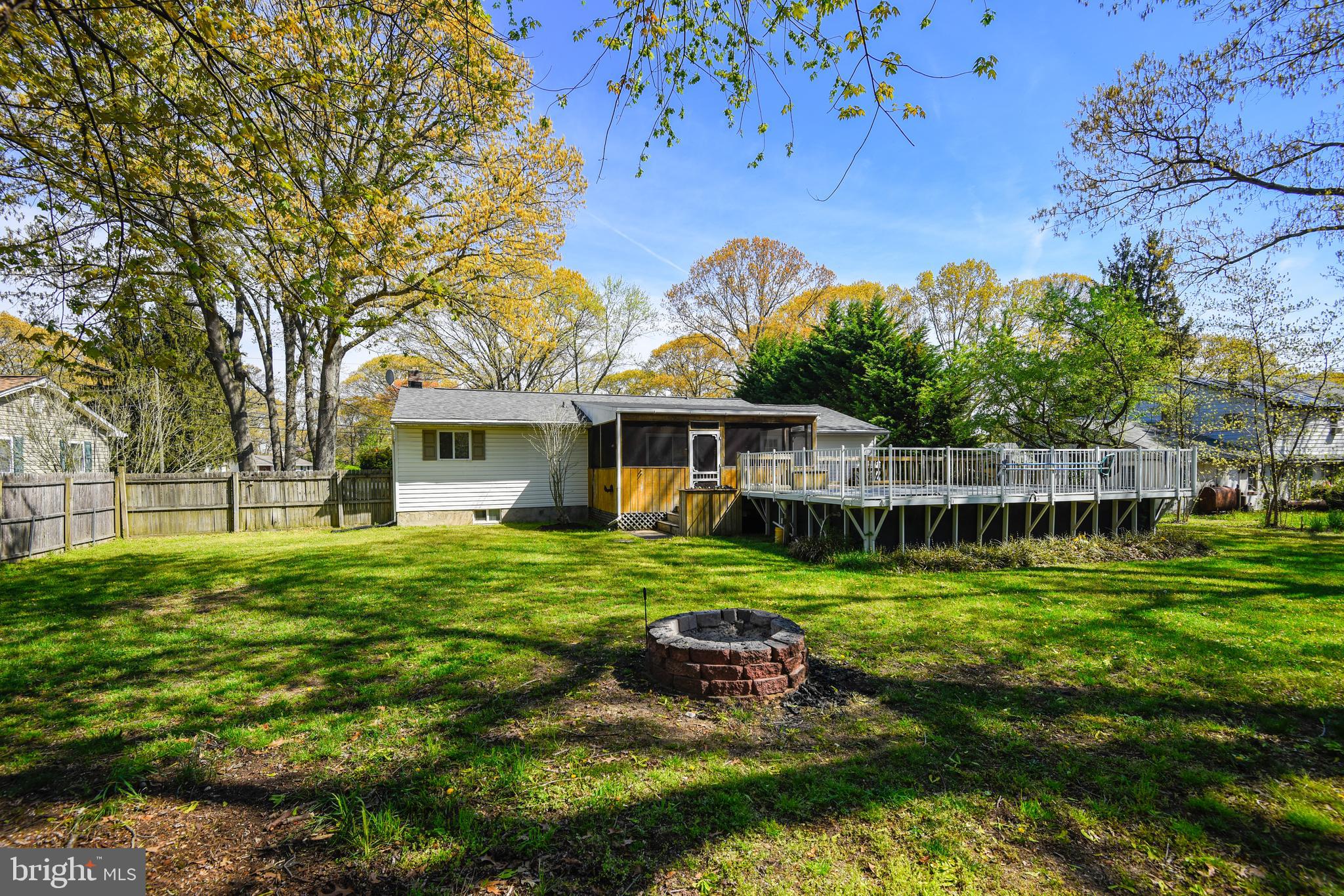552 Sunset Knoll Road Pasadena, MD 21122 - Photo 32 of 36 a front view of a house with a garden