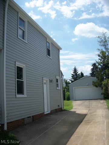 13202 Thraves Road Cleveland, OH 44125 - Photo 22 of 23 Driveway side of house.