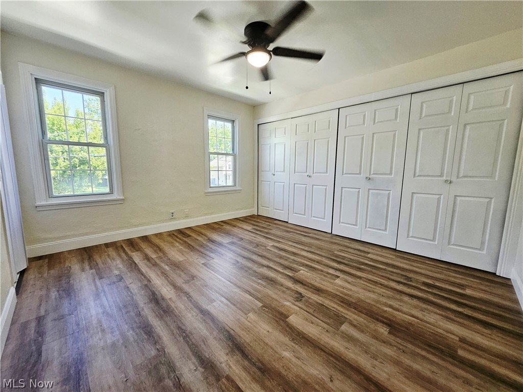 753 West River Road North Elyria, OH 44035 - Photo 14 of 28 Spacious room with wood-finish flooring and multiple paneled closet doors
