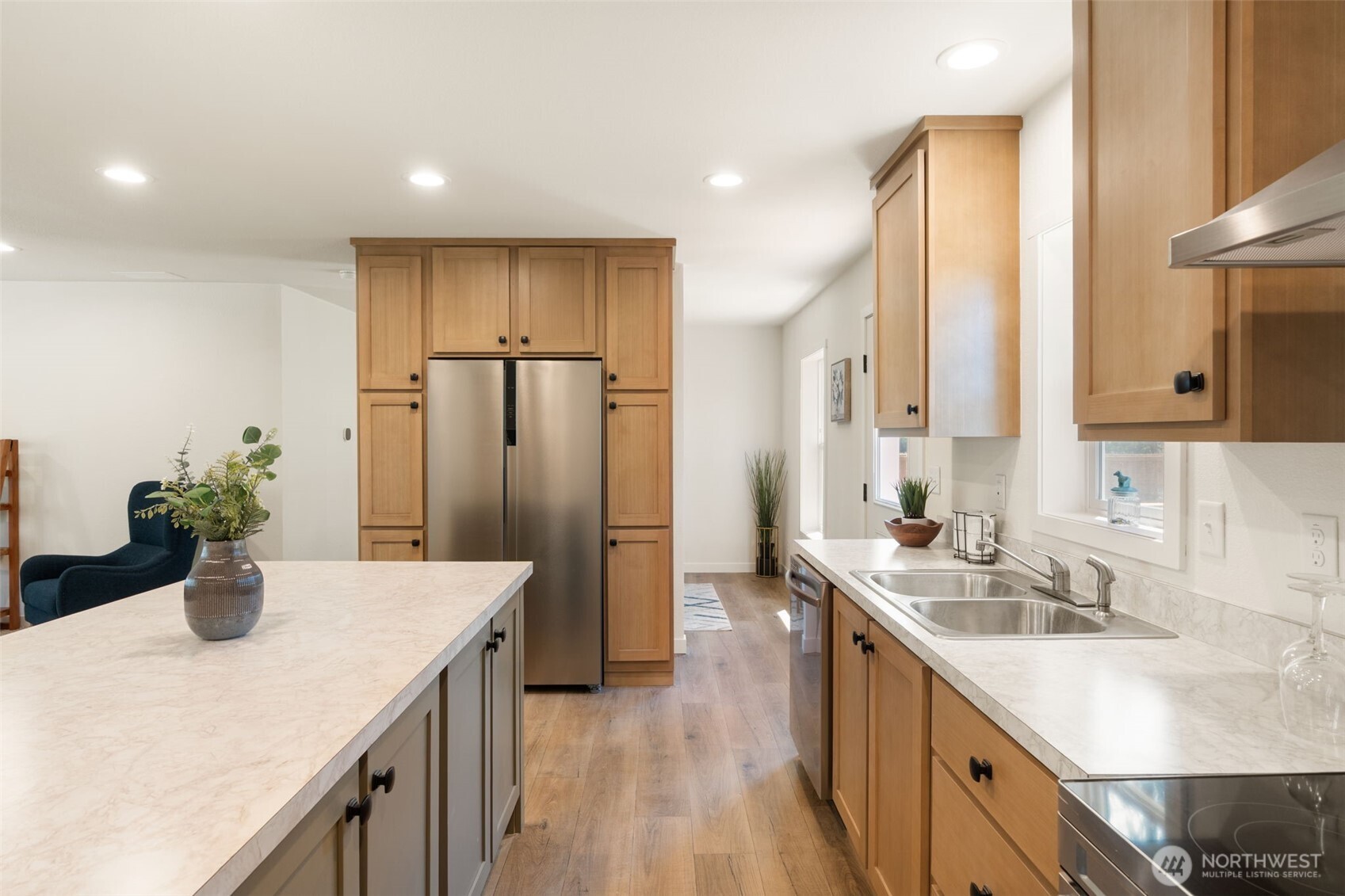 1090 Koontz Road Chehalis, WA 98532 - Photo 12 of 35 a kitchen with a sink and refrigerator