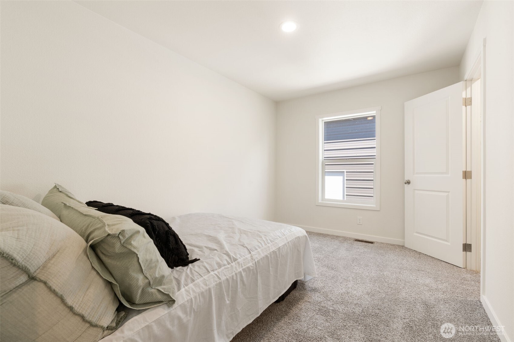 1090 Koontz Road Chehalis, WA 98532 - Photo 16 of 35 a bedroom with a bed and a window