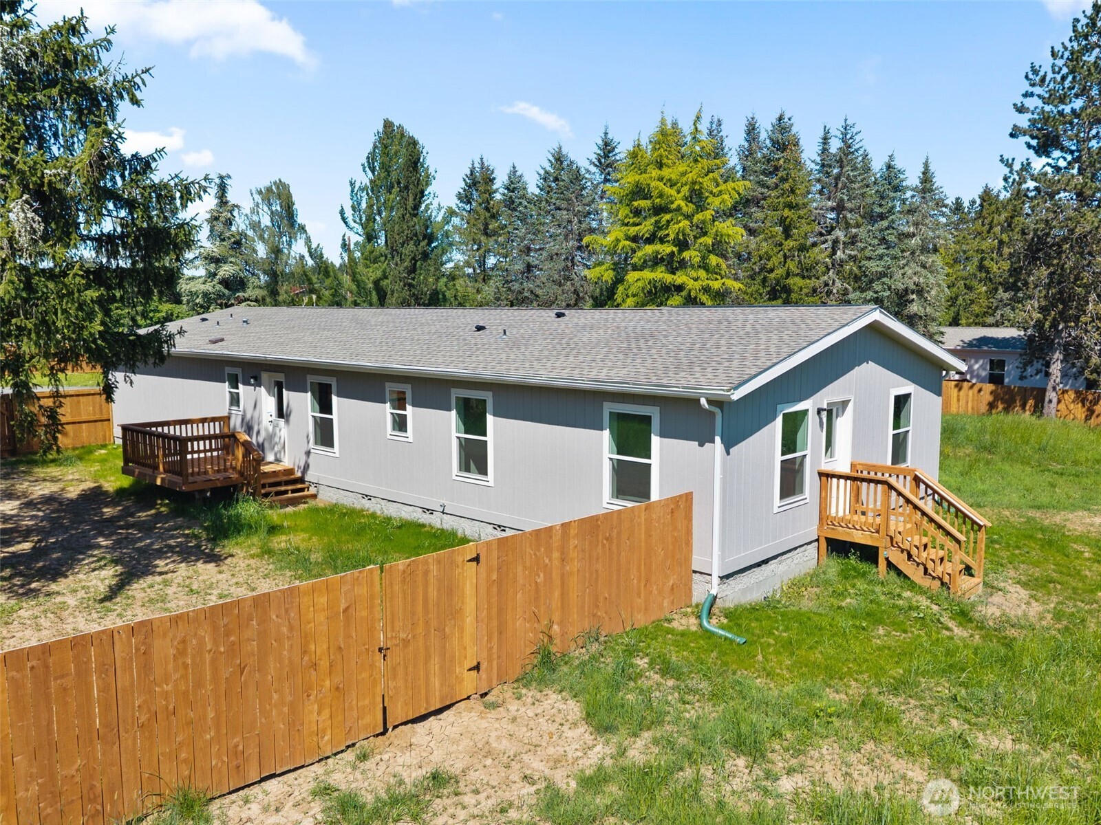1090 Koontz Road Chehalis, WA 98532 - Photo 31 of 35 a house with trees in the background