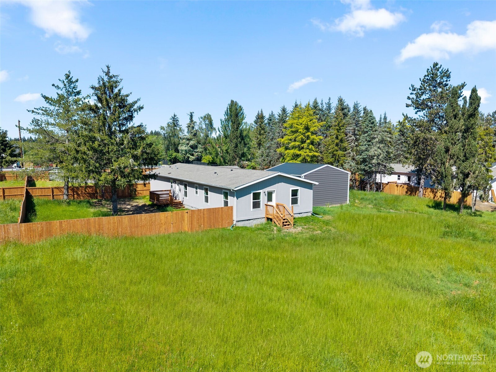 1090 Koontz Road Chehalis, WA 98532 - Photo 32 of 35 a front view of a house with garden
