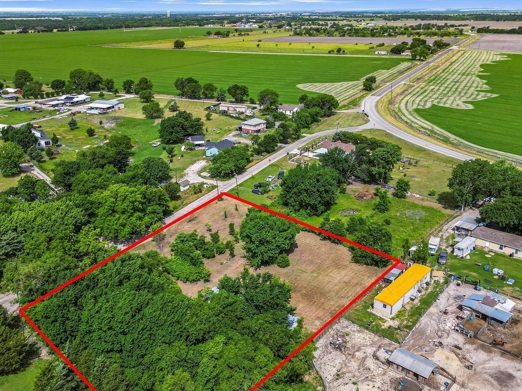 121 Wickliffe Road Ferris, TX 75125 - Photo 10 of 10 Expansive lot featuring a mix of mature trees and open land