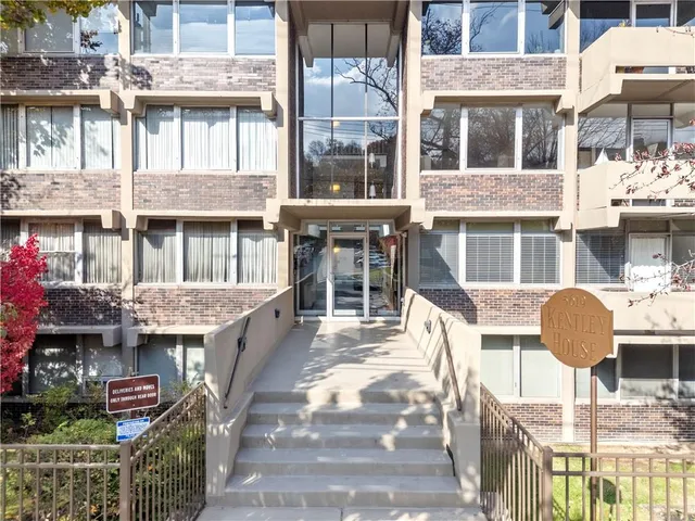 a front view of house with outdoor seating
