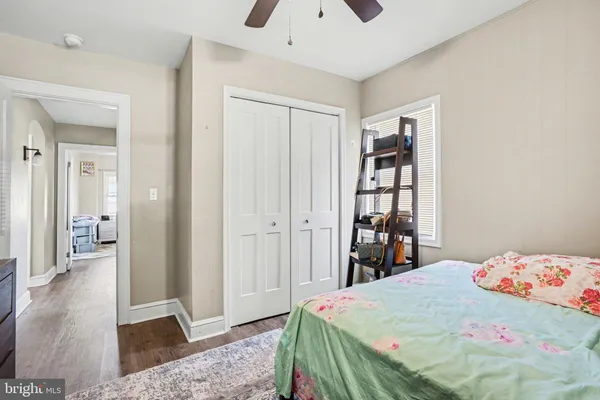 a bedroom with a bed and a cabinets