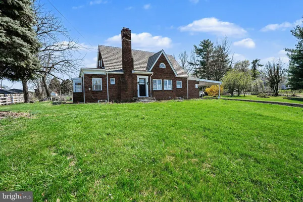 a house view with a garden space