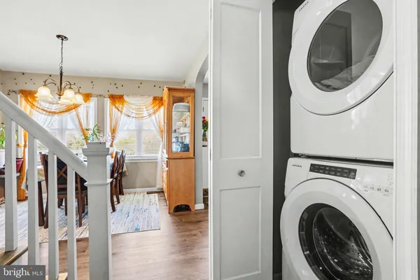 a view of a hallway with washer and dryer