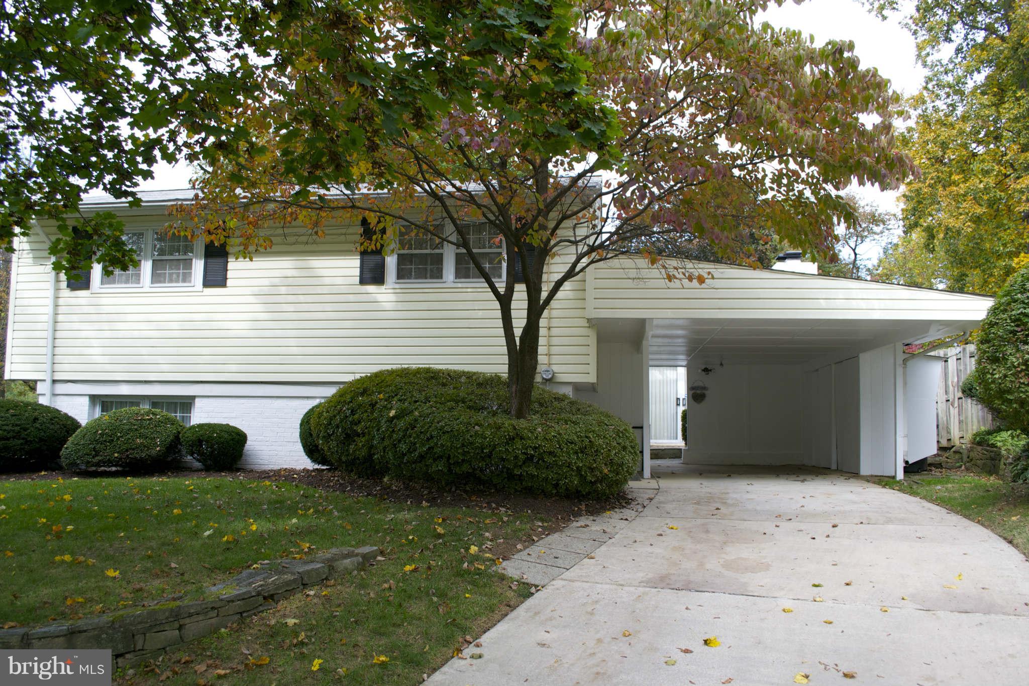 13209 Holdridge Road Silver Spring, MD 20906 - Photo 18 of 18 a view of a house with a backyard