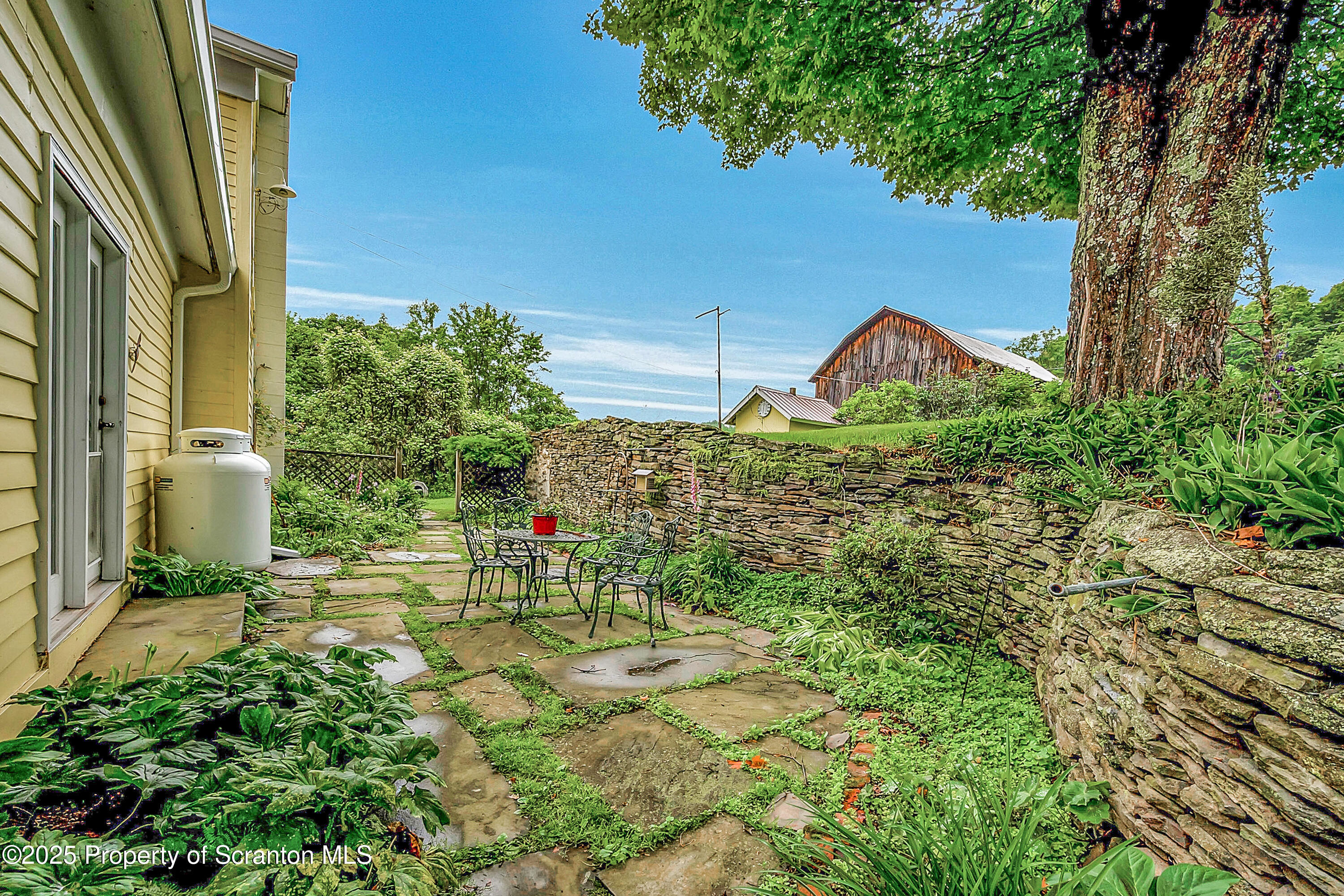11 Manzer Road New Milford, PA 18834 - Photo 13 of 63 Charming slate patio