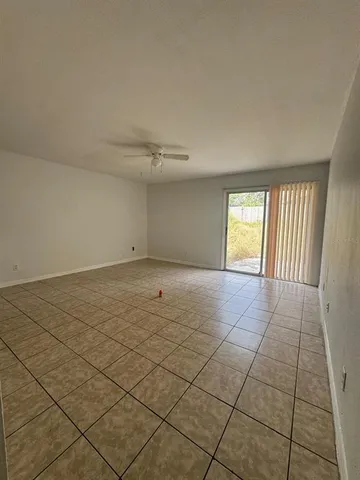 a view of an empty room and window