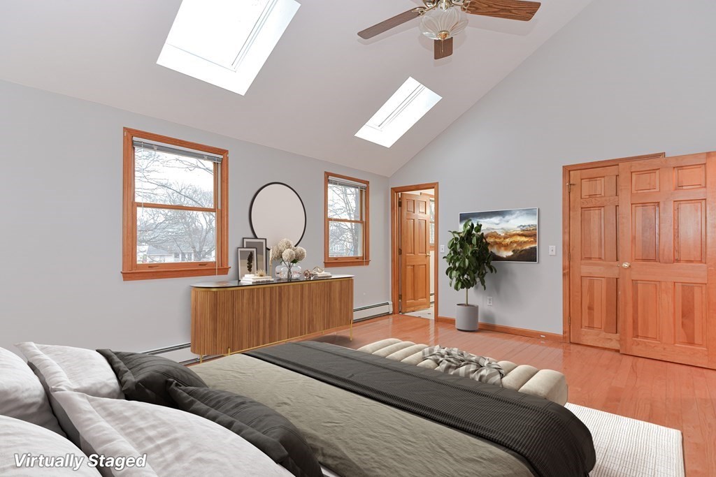 4 Bugli Lane Wakefield, MA 01880 - Photo 17 of 32 a bedroom with bed and window