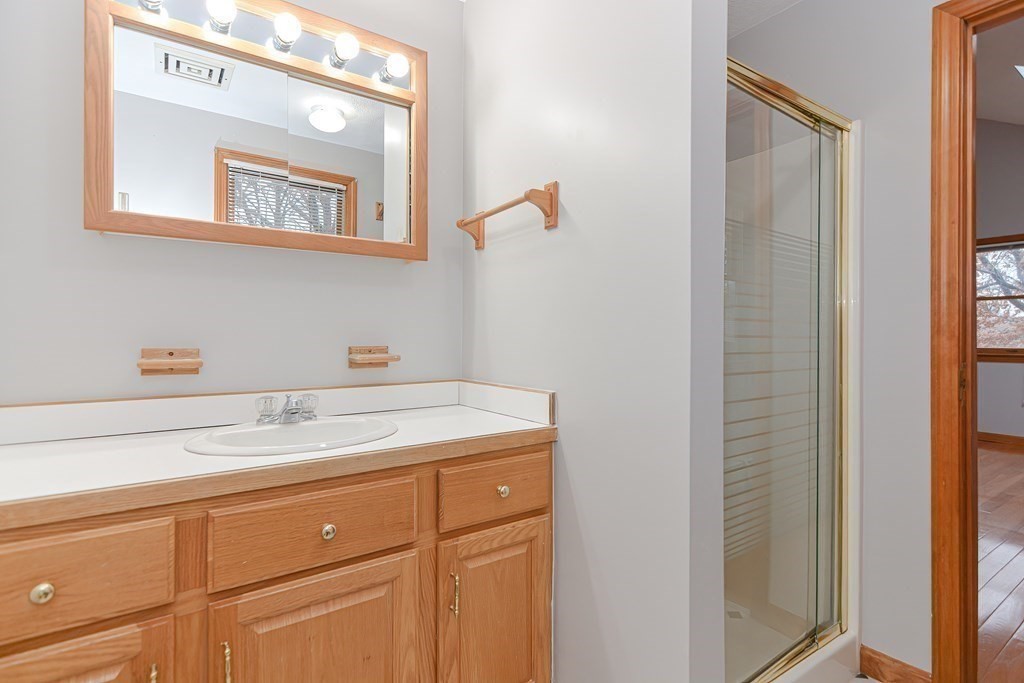 4 Bugli Lane Wakefield, MA 01880 - Photo 21 of 32 a utility room with a sink dryer and washer