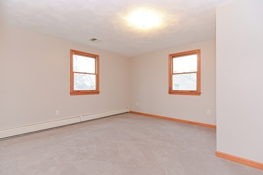 4 Bugli Lane Wakefield, MA 01880 - Photo 28 of 32 an empty room with a window