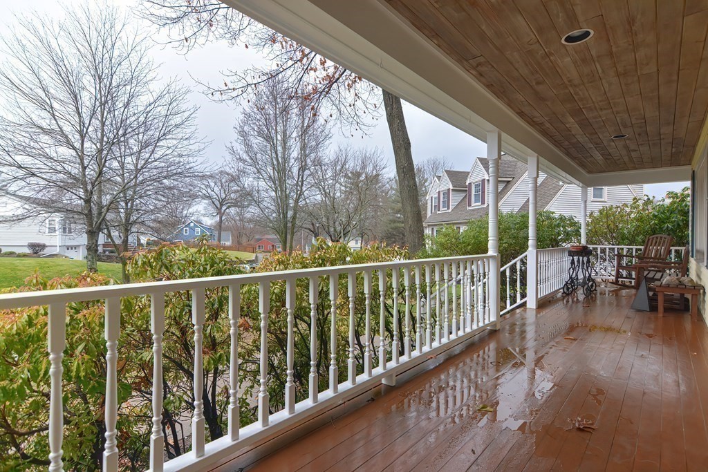 4 Bugli Lane Wakefield, MA 01880 - Photo 3 of 32 a view of balcony with chairs
