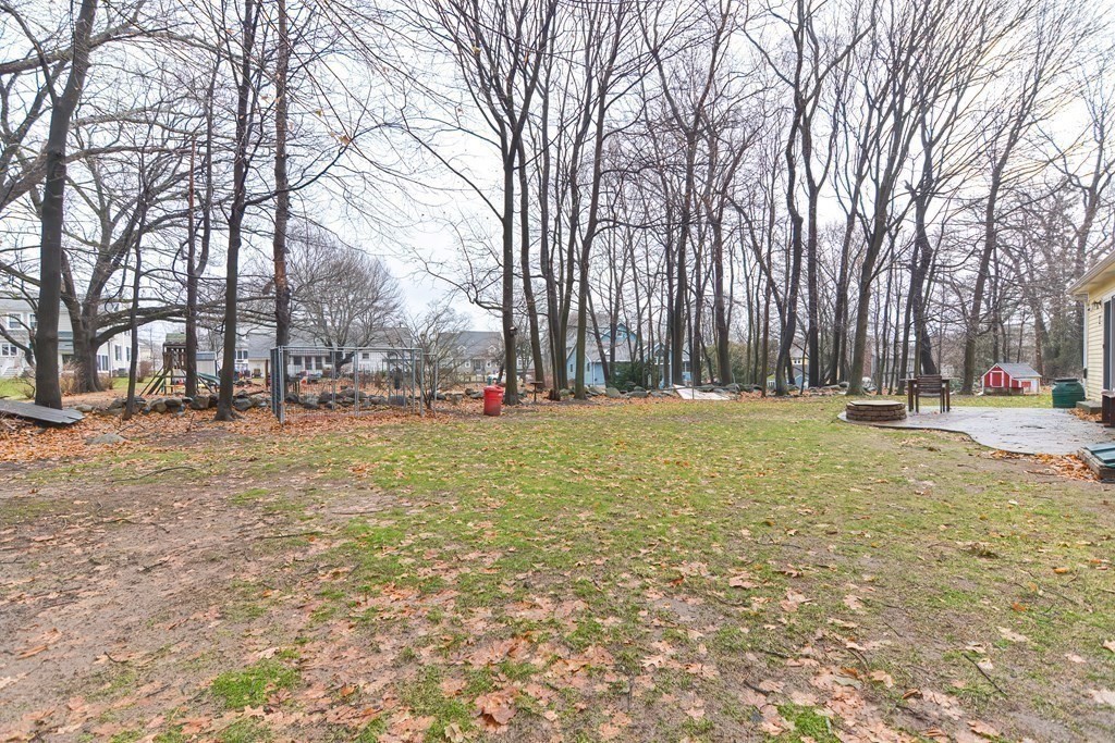 4 Bugli Lane Wakefield, MA 01880 - Photo 32 of 32 a view of outdoor space with garden and trees