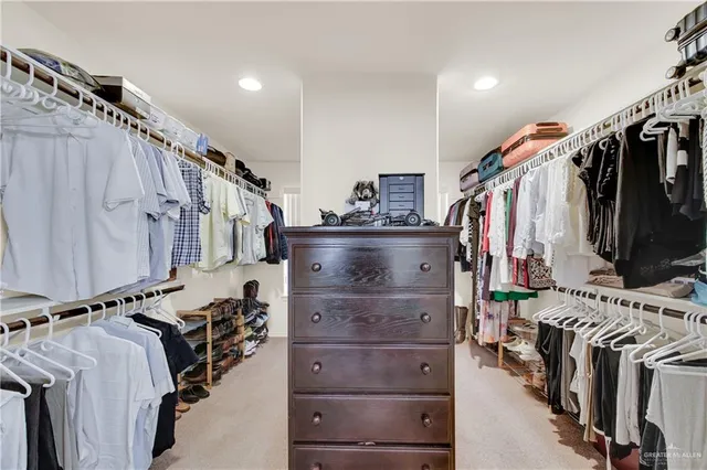 a bedroom with a bed and furniture