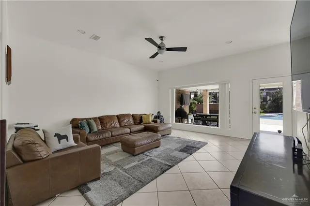 a living room with furniture and window