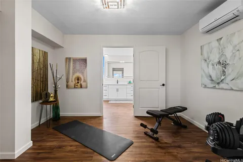 a living room with furniture and a rug