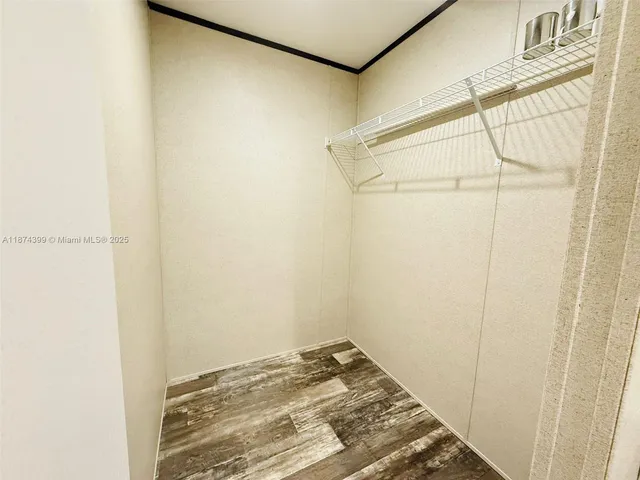 a view of a room with an empty space