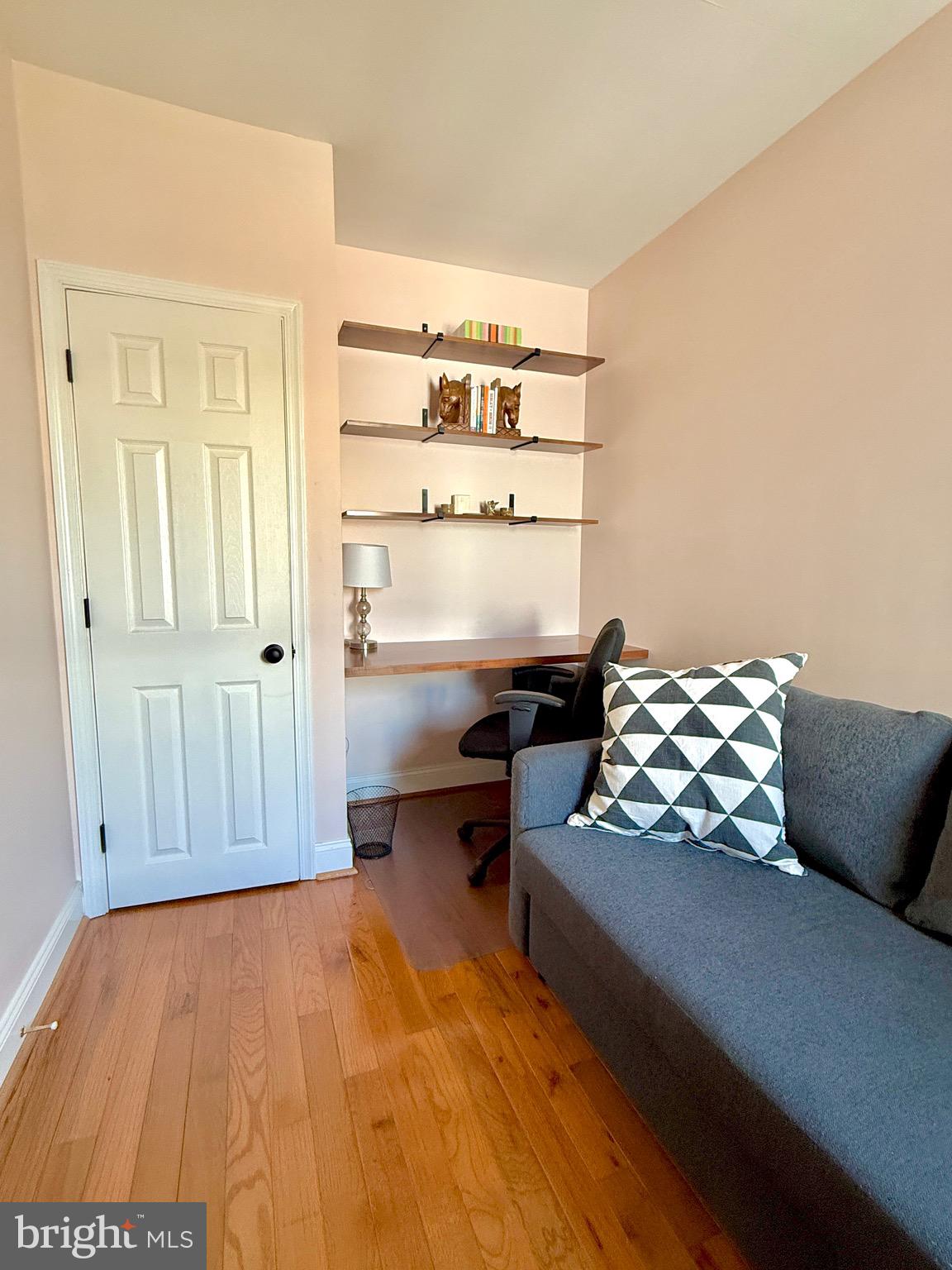 1509 Emily Street Philadelphia, PA 19145 - Photo 19 of 33 a living room with furniture rug and wooden floor