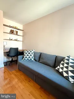 a living room with furniture and a couch