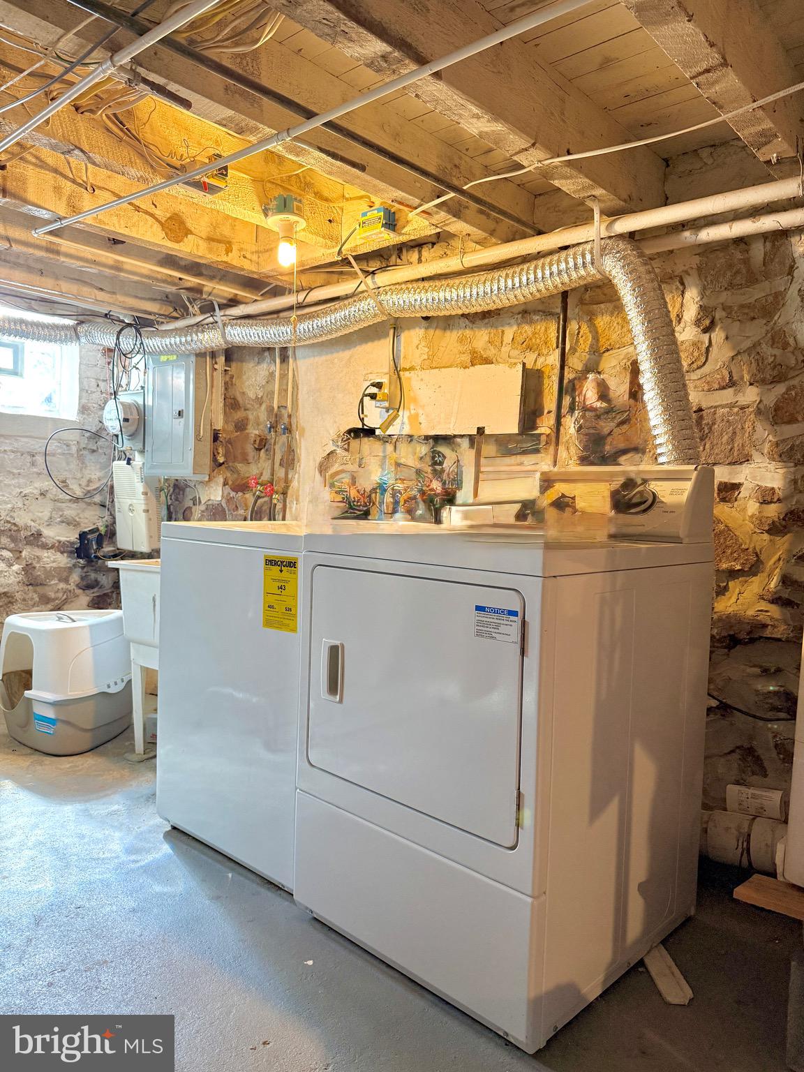 1509 Emily Street Philadelphia, PA 19145 - Photo 30 of 33 a utility room with dryer and washer
