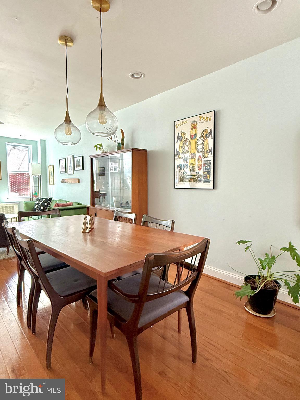 1509 Emily Street Philadelphia, PA 19145 - Photo 5 of 33 a view of a dining room with furniture and a chandelier