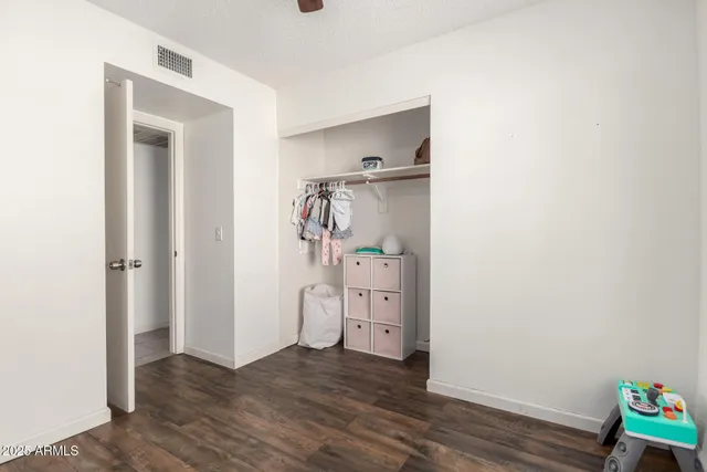 a bathroom with a toilet and a sink