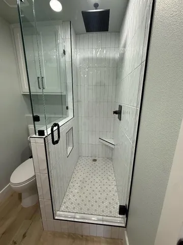 a bathroom with a sink and toilet