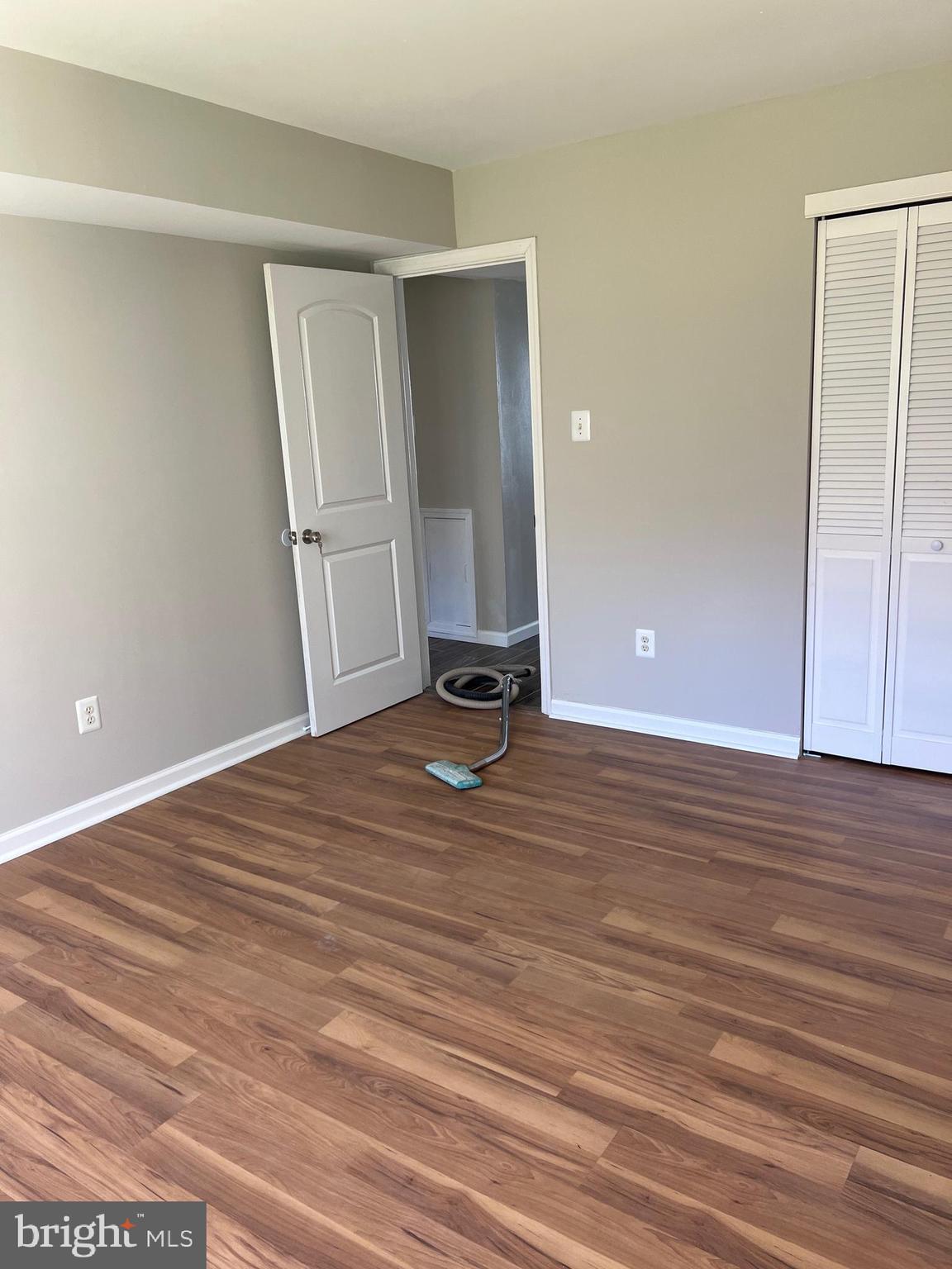 16 Maynard Drive, Unit A Sicklerville, NJ 08081 - Photo 13 of 17 a view of a room with wooden floor