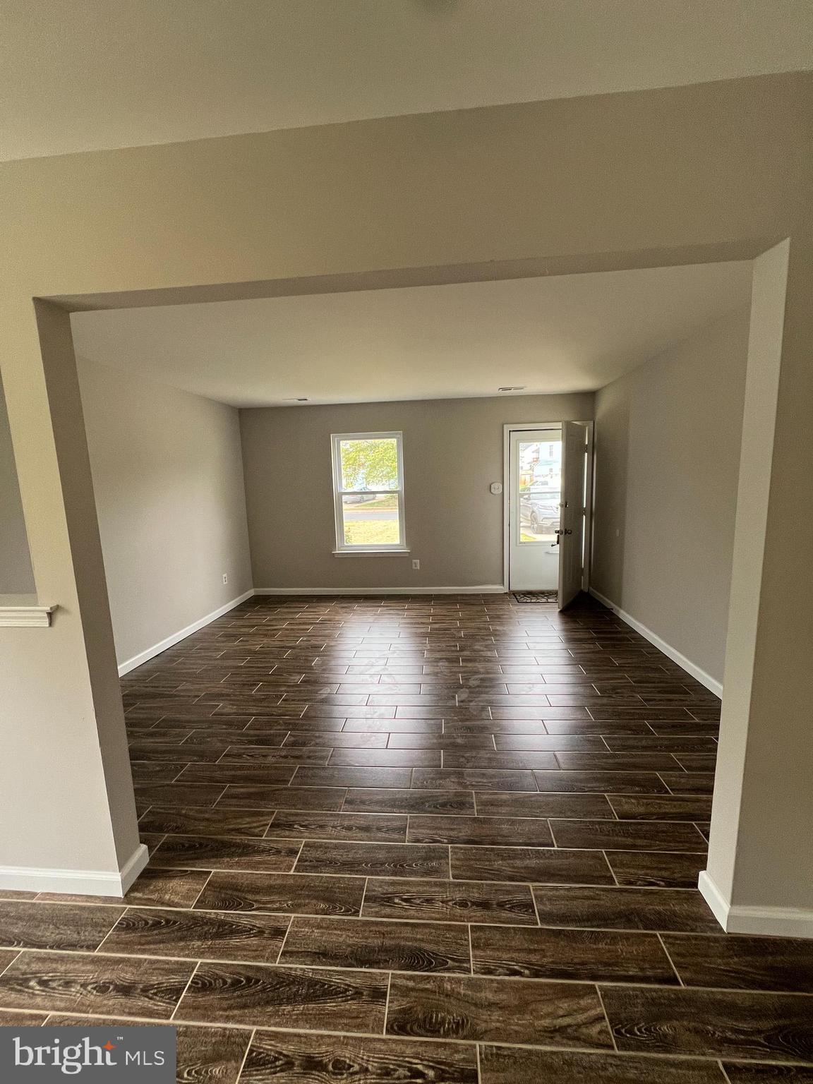 16 Maynard Drive, Unit A Sicklerville, NJ 08081 - Photo 2 of 17 a view of wooden floor and windows in a room
