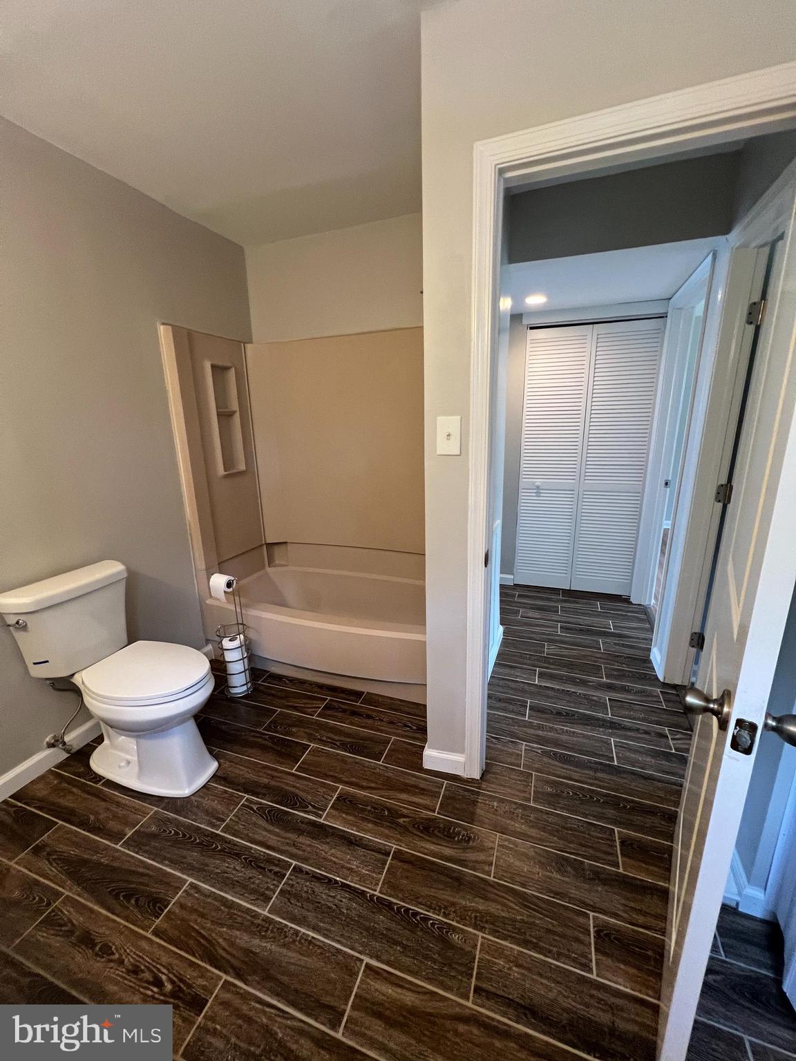 16 Maynard Drive, Unit A Sicklerville, NJ 08081 - Photo 10 of 17 a bathroom with a toilet and a shower