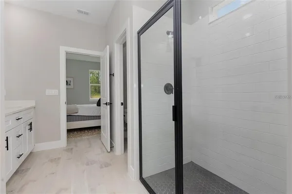 a view of a bedroom from bathroom