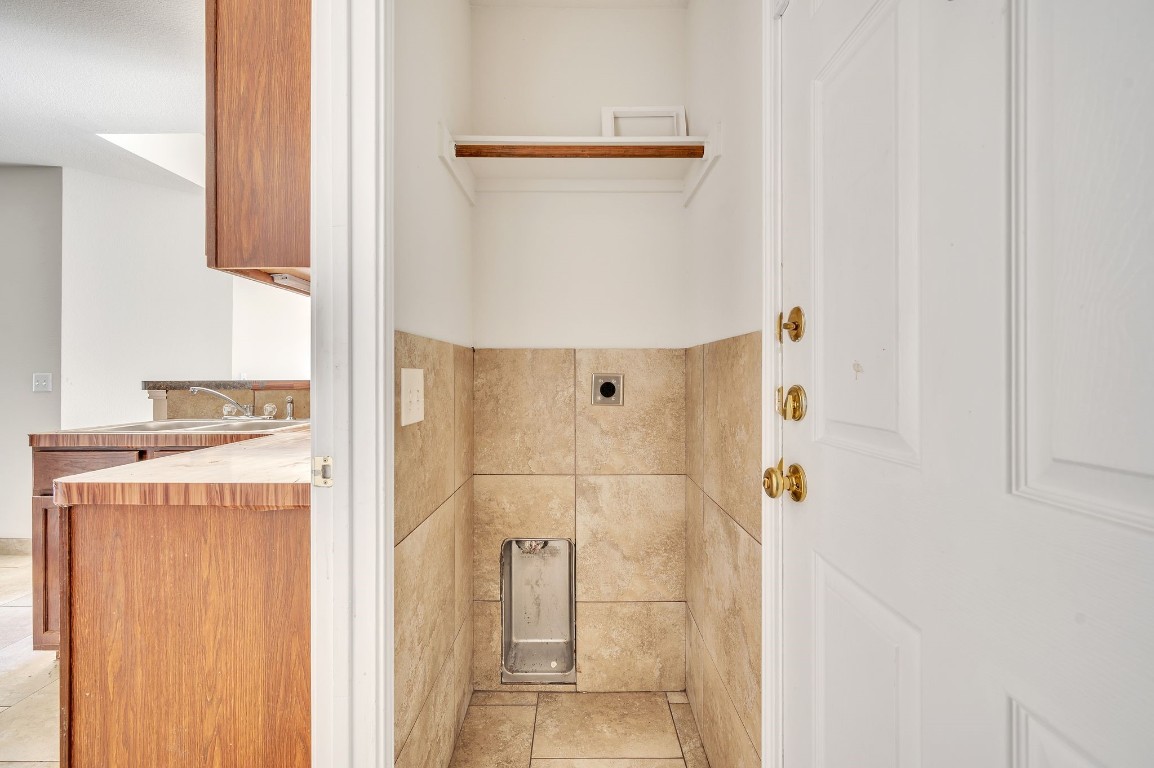 1007 Trail Driver Cove Georgetown, TX 78626 - Photo 16 of 16 a bathroom with a shower and a sink