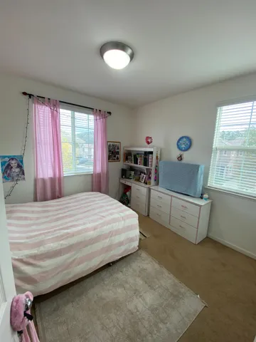 a view of a house with a street