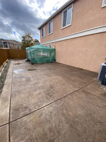 a view of a back yard of the house