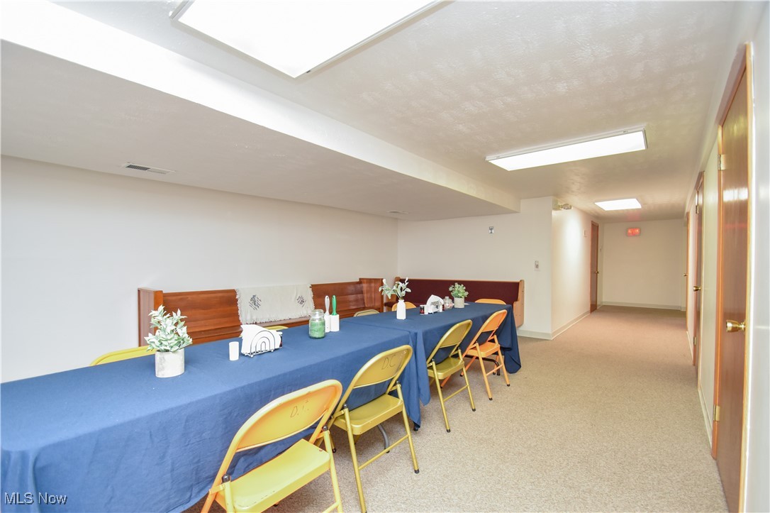 1187 Deforest Road Southeast Warren, OH 44484 - Photo 33 of 42 Dining space featuring light colored carpet