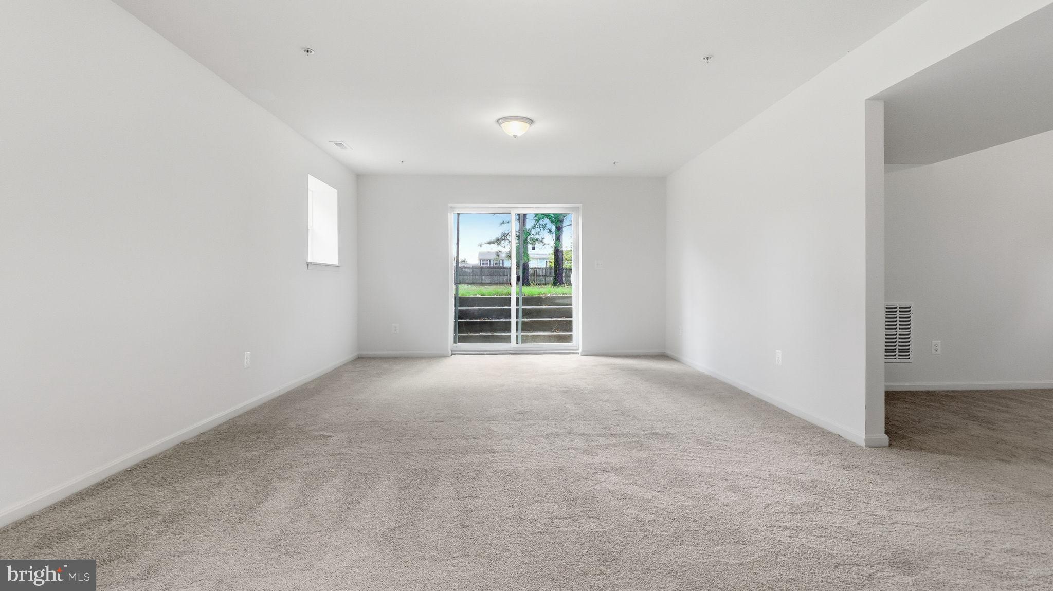 7349 Hughes Avenue Sparrows Point, MD 21219 - Photo 11 of 38 an empty room with windows