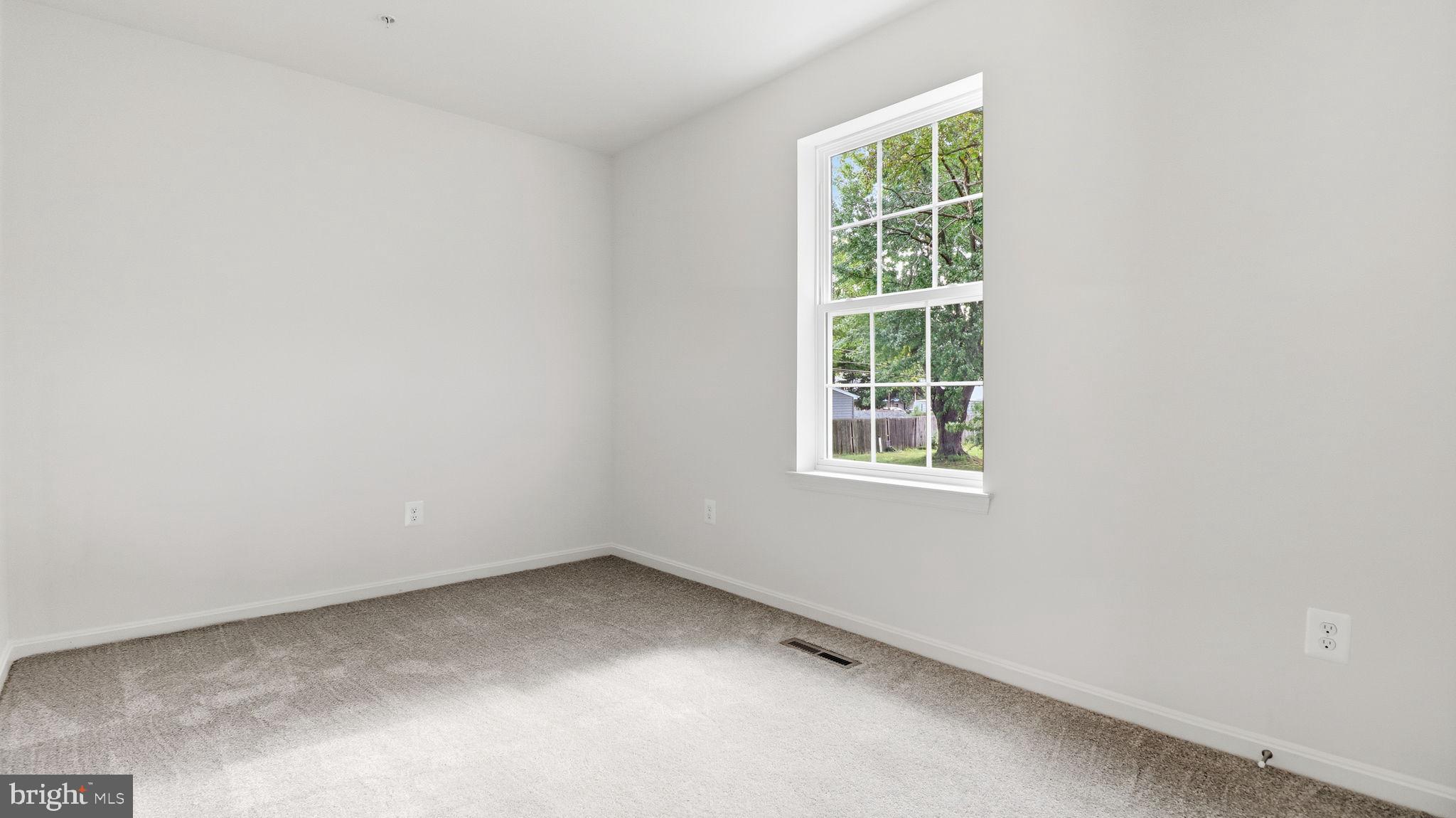 7349 Hughes Avenue Sparrows Point, MD 21219 - Photo 22 of 38 an empty room with a window