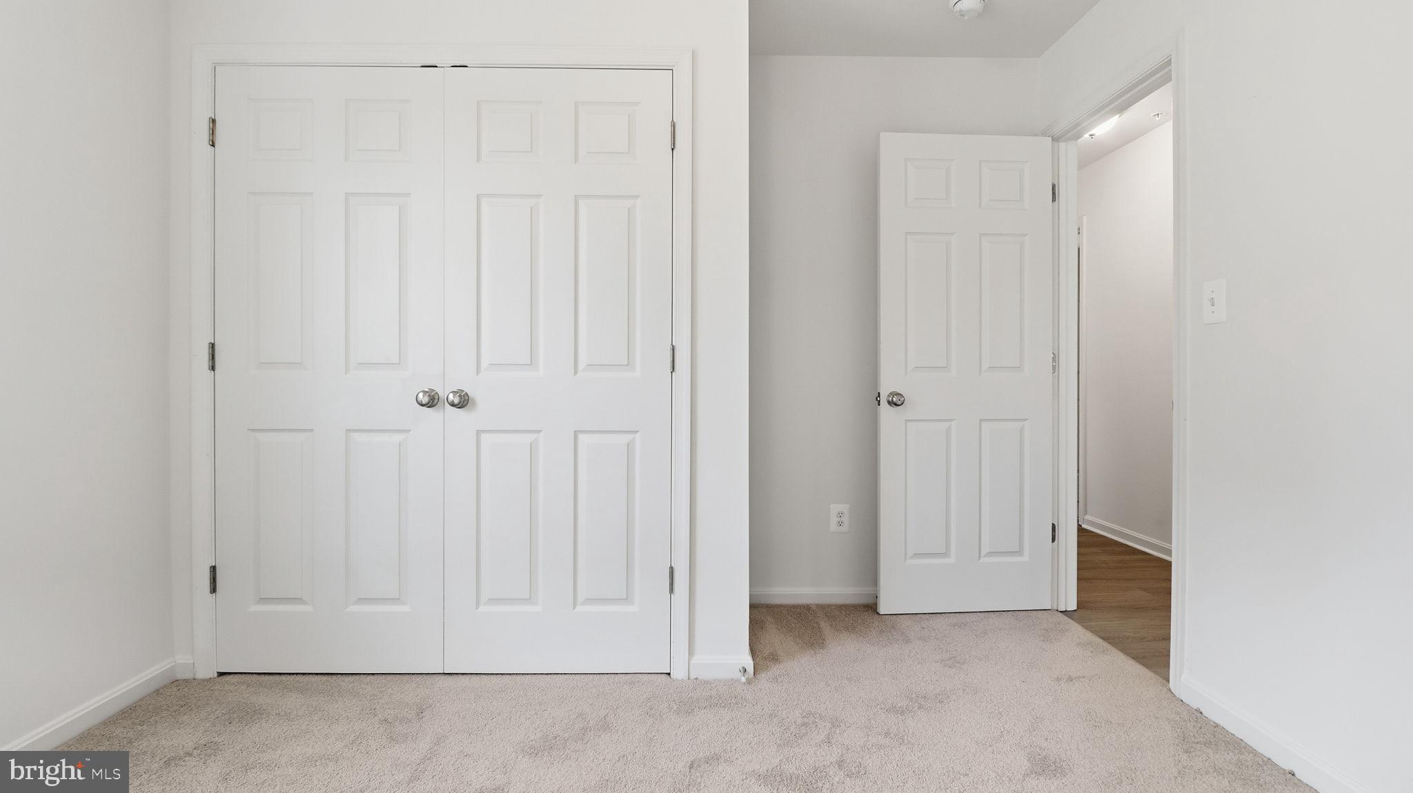 7349 Hughes Avenue Sparrows Point, MD 21219 - Photo 25 of 38 an empty room with white door