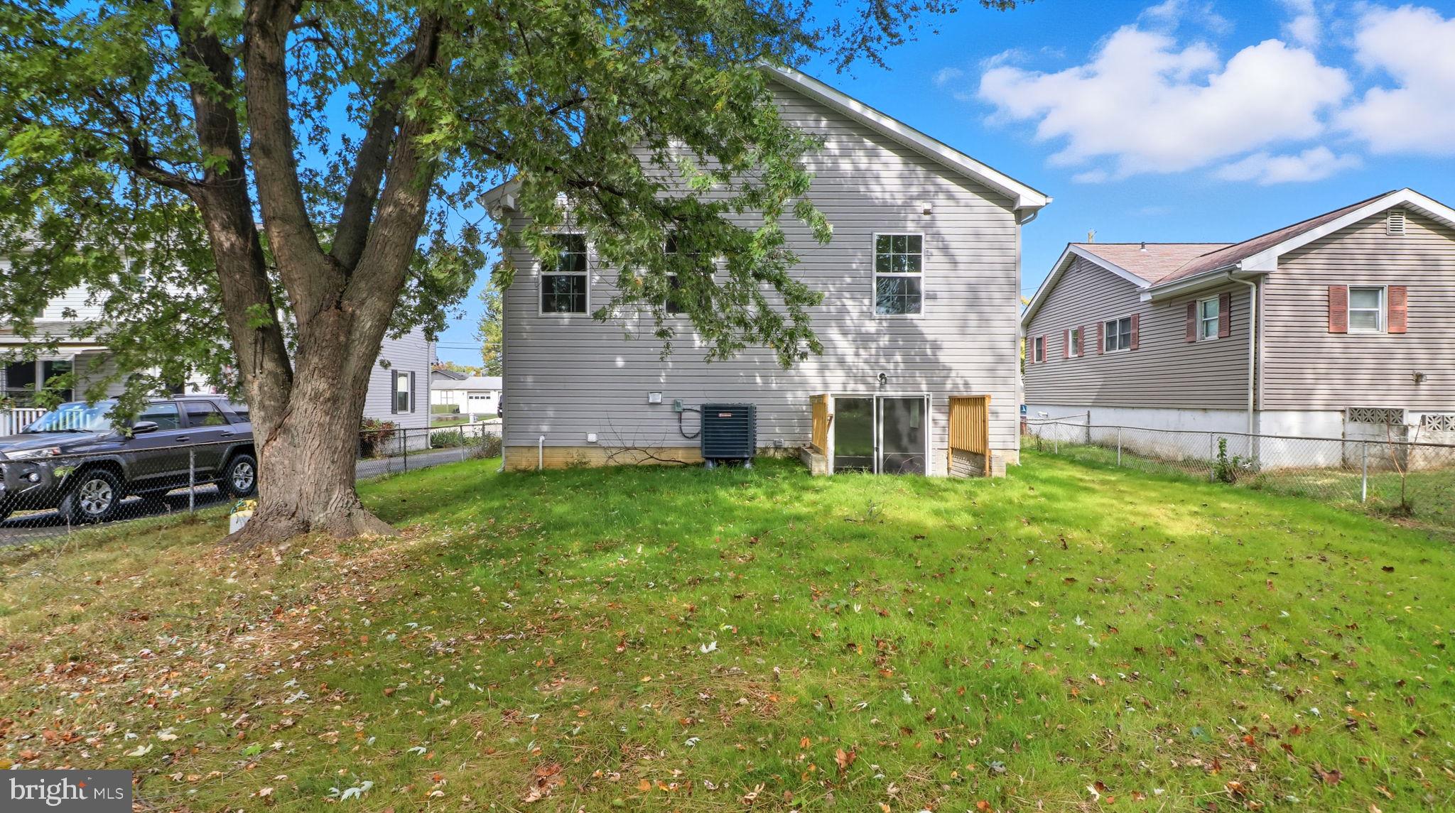 7349 Hughes Avenue Sparrows Point, MD 21219 - Photo 5 of 38 a view of a house with a back yard