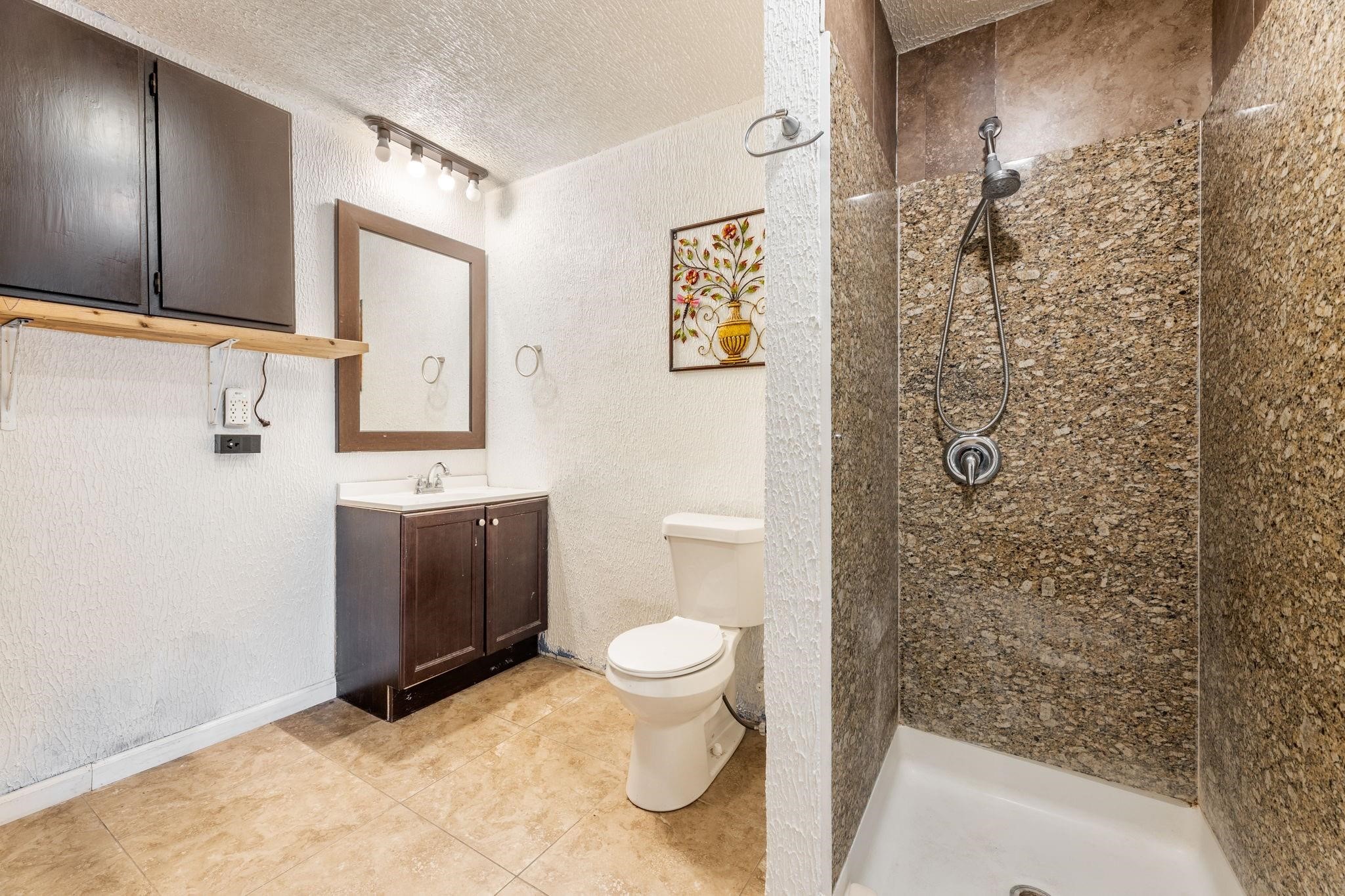 3606 Balmorhea Avenue Houston, TX 77039 - Photo 17 of 21 a bathroom with a toilet sink and shower