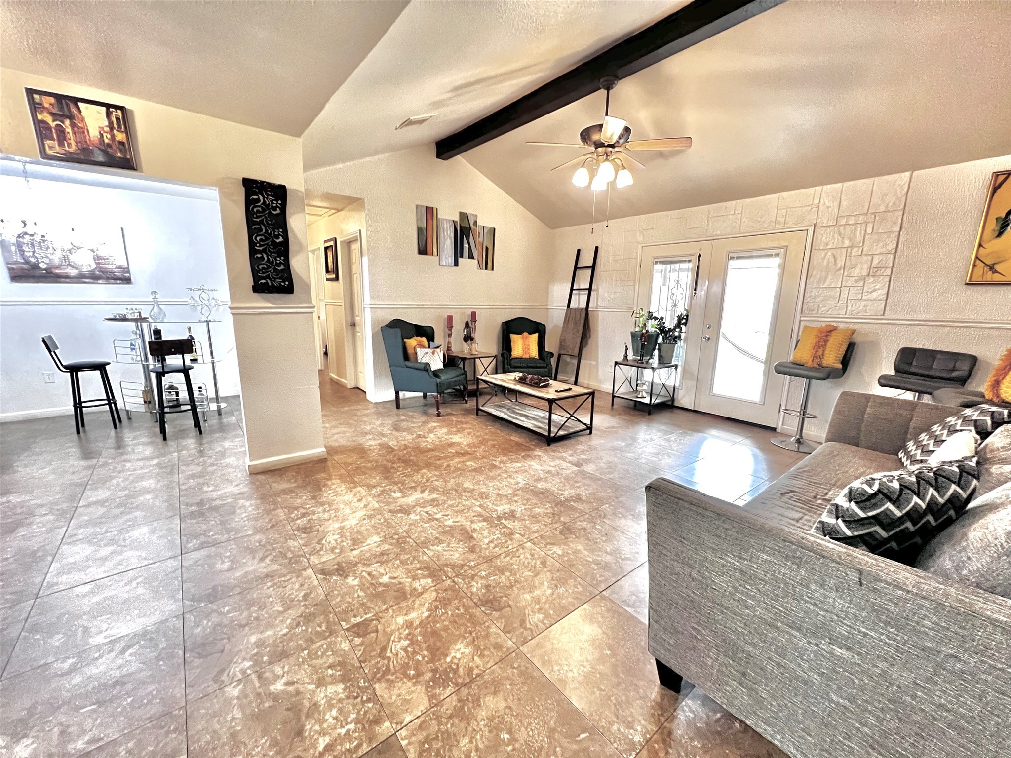 3606 Balmorhea Avenue Houston, TX 77039 - Photo 4 of 21 a living room with furniture and a chandelier