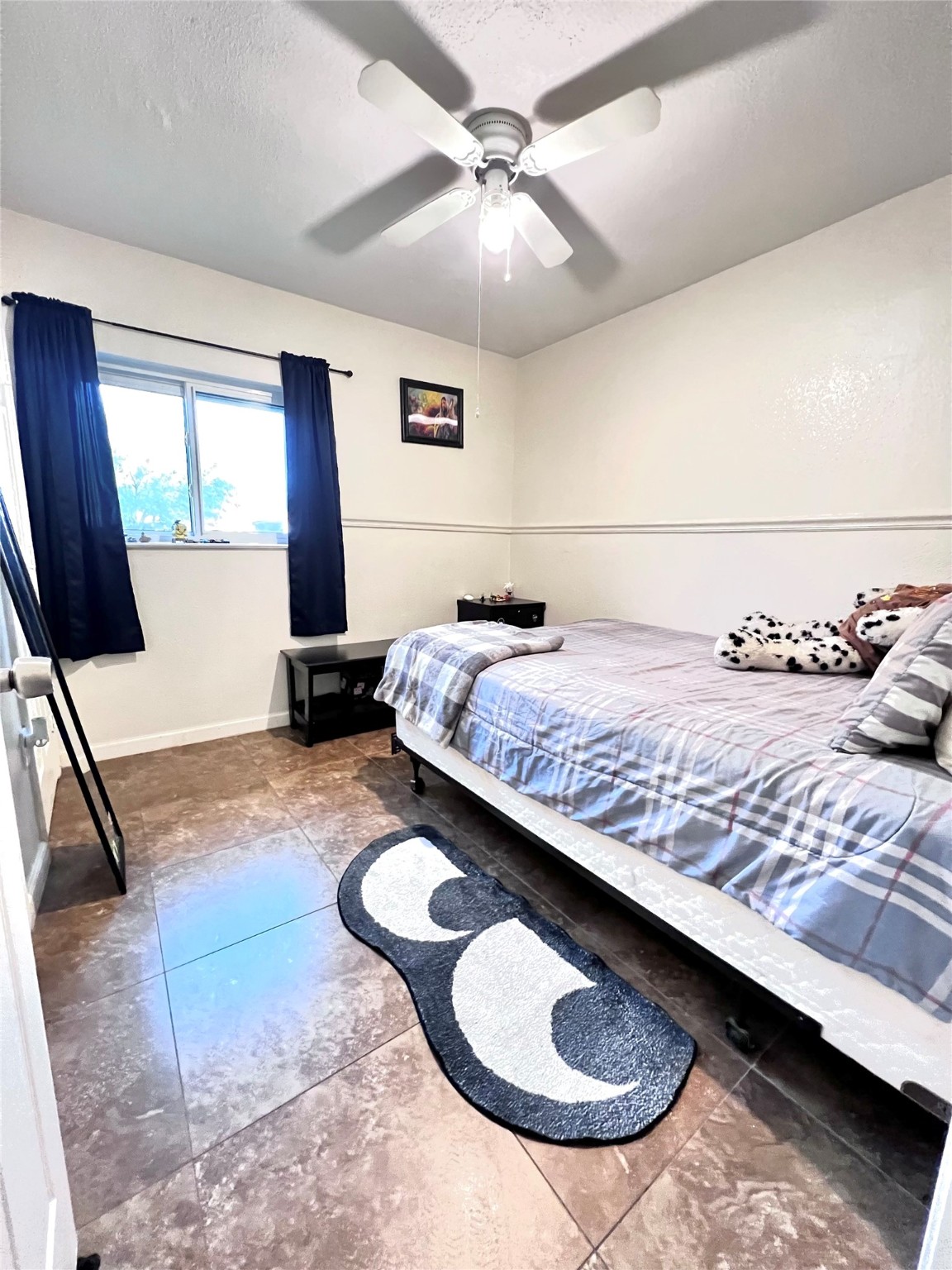 3606 Balmorhea Avenue Houston, TX 77039 - Photo 10 of 21 a bedroom with a bed and window