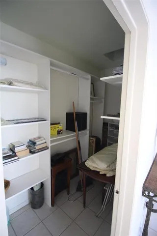 a kitchen with a table and chairs