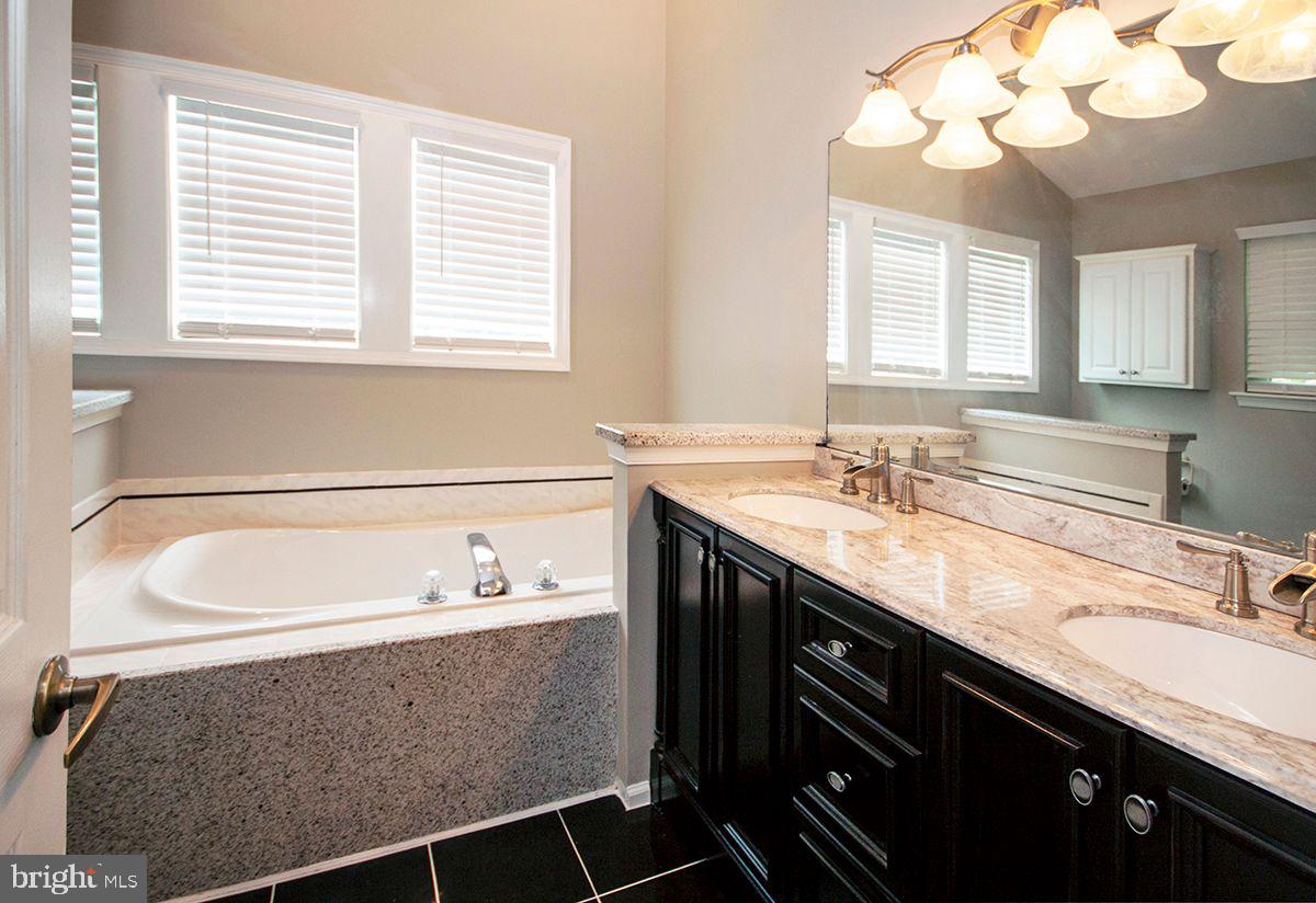 16 Militia Hill Road Sicklerville, NJ 08081 - Photo 21 of 38 Master Bathroom: Tile Floors, Soaking Tub, Shower