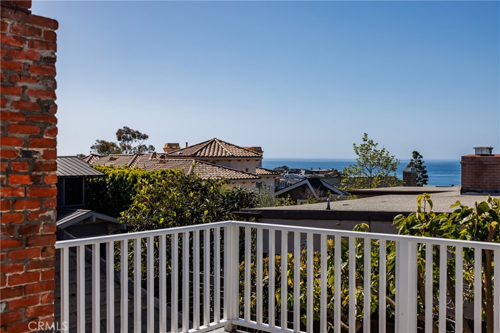 351 Hazel Drive Corona del Mar, CA 92625 - Photo 2 of 58 a view of a balcony with wooden fence and floor