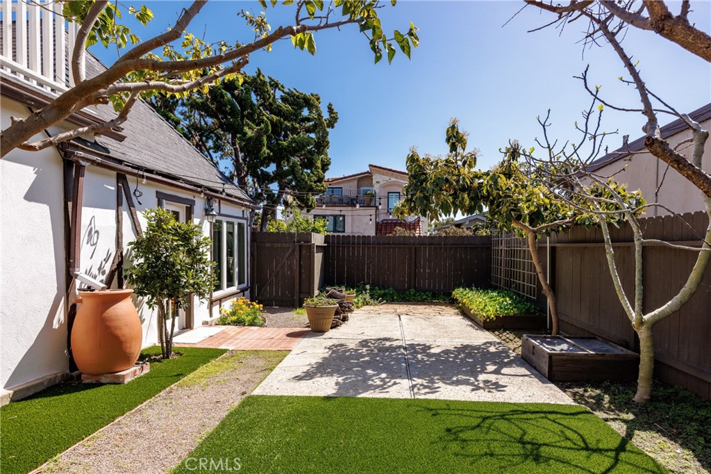 351 Hazel Drive Corona del Mar, CA 92625 - Photo 30 of 58 a front view of a house with garden