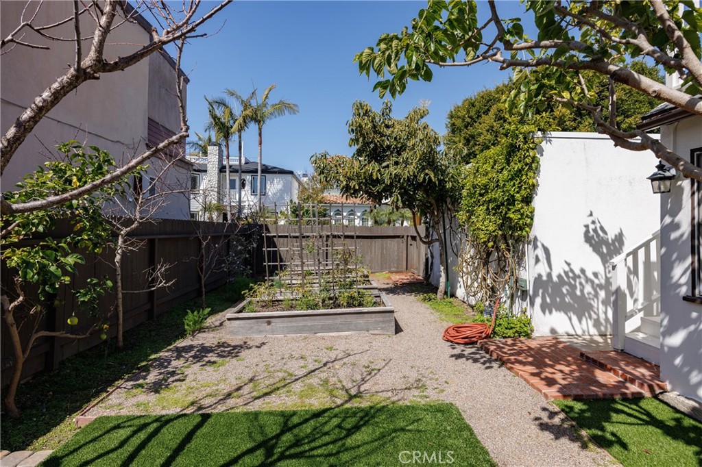 351 Hazel Drive Corona del Mar, CA 92625 - Photo 32 of 58 a backyard of a house with outdoor seating